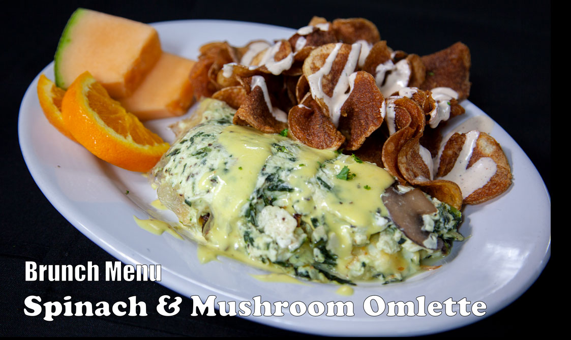 Spinach and mushroom omlette with fruit